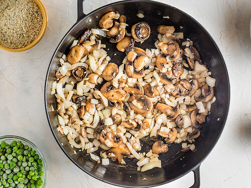 Sautéed mushrooms, softened onions, and fragrant minced garlic in a large skillet.