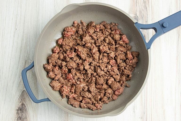 Ground beef in skillet.