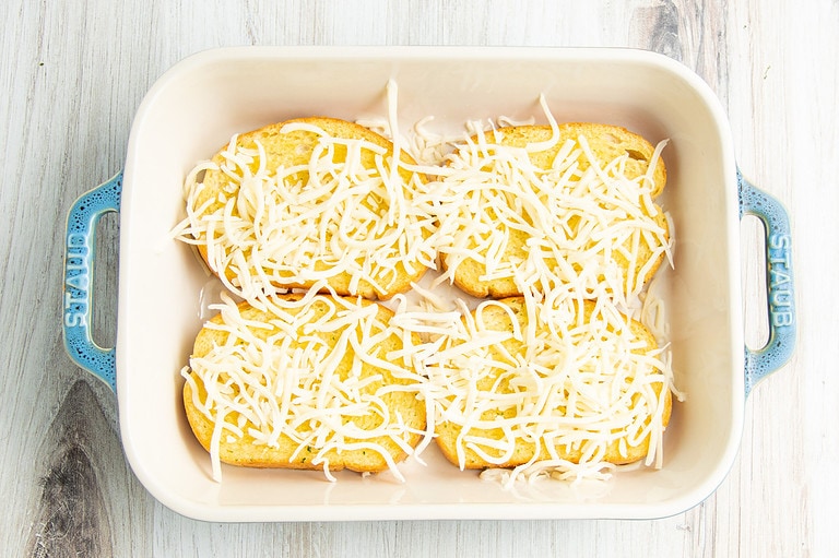 Mozzarella on Texas Toast in baking dish.